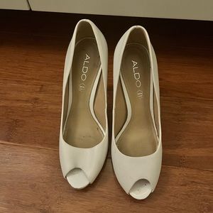 Barely worn Aldo white high heels in size 7